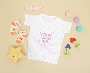 Baby Shirt Mockup Surrounded by Little Girl Accessories