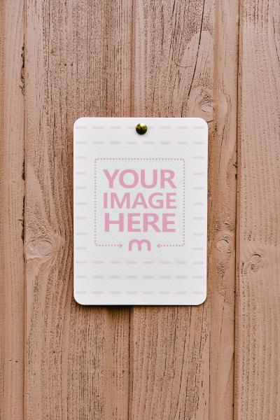 Card Hanging on Wooden Wall PSD Template