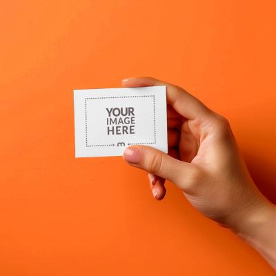 Eye-Catching Hand Holding Business Card Mockup