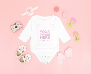 Flatlay Baby Onesie Mockup Surrounded by Little Girl Accessories