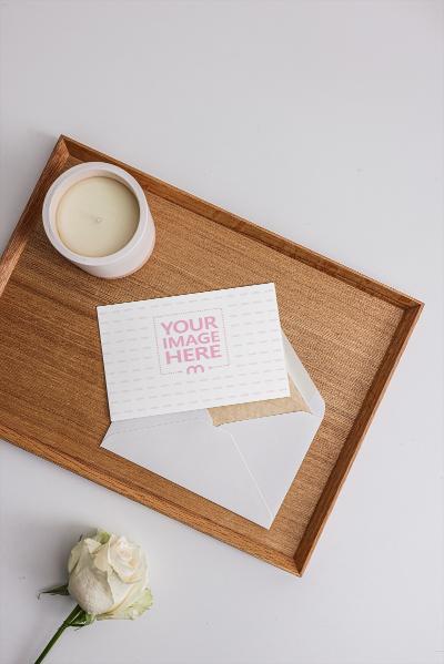 Greeting Card on Decorated Desk Mockup Template