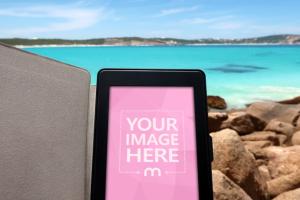 Kindle eBook Reader on Beach Background Mockup Generator