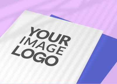 Logo Mockup on Stack of Paper with Purple Wall