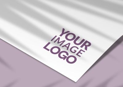 Logo Mockup on White Paper and Purple Background