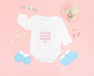 Long Sleeve Baby Bodysuit Mockup Laid Over on a Pink Background