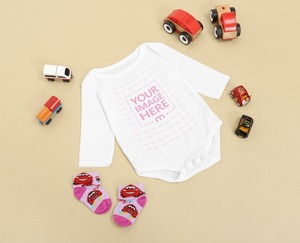 Long Sleeve Baby Onesie Mockup Laid Over Brown Background