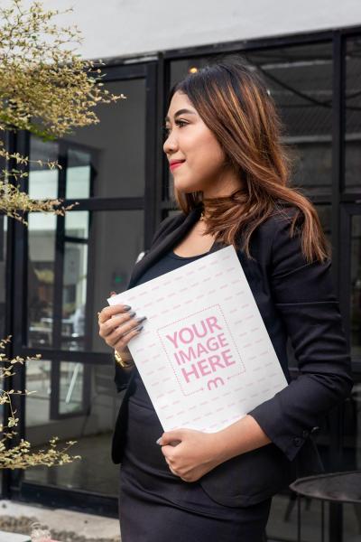 Magazine Cover Mockup Held by a Smiling Woman