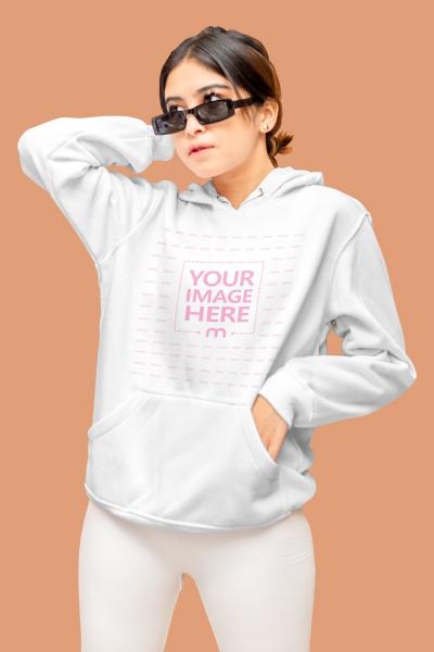 Mockup of a Hoodie With the Model Posing While looking Sideways