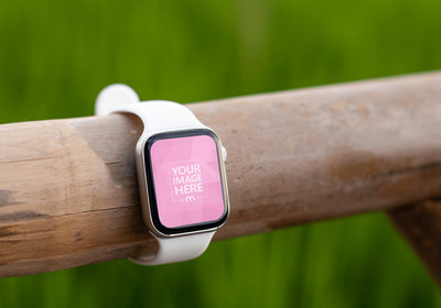 Mockup of a Smartwatch Put on a Bamboo With the Rice Field as background