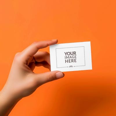 Modern Business Card in Hand Mockup with Bright Background