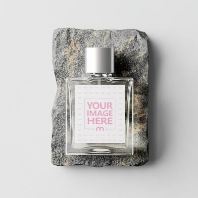 Perfume Bottle Label Mockup on Textured Surface for Branding