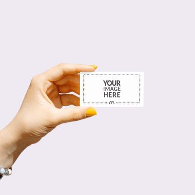 Person Holding Business Card Mockup on Editable Background