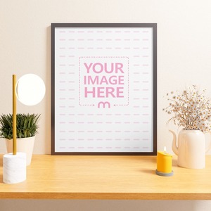 Portrait Canvas Mockup on Top of a Desk With A pot of Flower and Small Candle