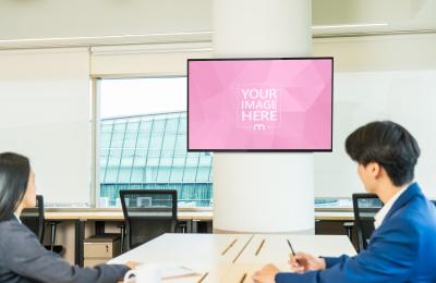 Presentation Screen Mockup Hanging on Wall of Office in Meetings