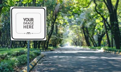 Rectangular Street Sign Template on a Forested Road