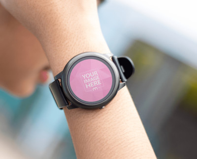 Rounded Smartwatch Mockup With a Woman Stroking Her Hair