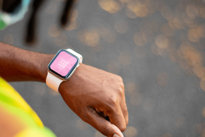 Smartwatch Mockup Featuring a Model Looking to it