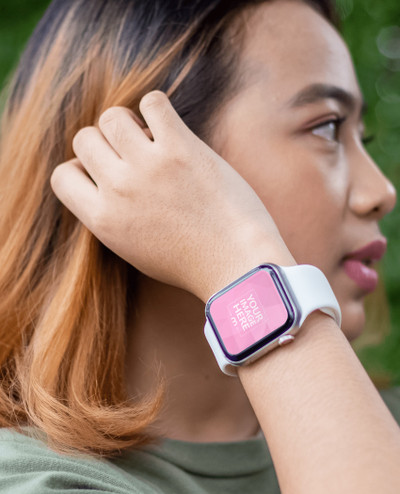 Smartwatch Mockup With a Woman Looking Sideways