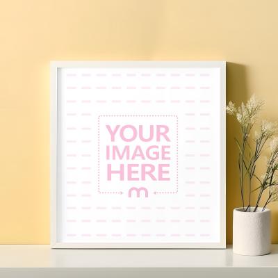 Square Sized Poster & Art Frame Mockup on Modern White Table