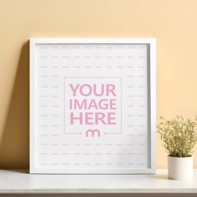 Square Sized Poster & Art Frame Mockup on White Table Top