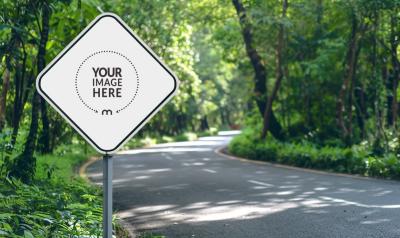 Street Sign Mockup on a Forested Road