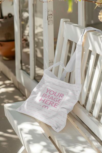 Aesthetic Tote Bag Mockup Generator Placed On Shadowy Bench