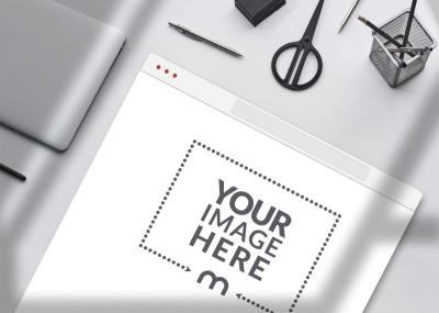 Website Screen Mockup with a Black and White Desk