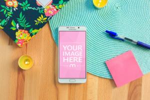 White Android Smartphone on Desk Mockup