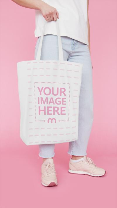 Woman Holding Tote Bag Mockup Generator