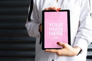 Woman Showcasing Android Tablet Computer Screen