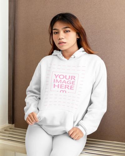 Young Woman Posing With Her Hoodie Mockup